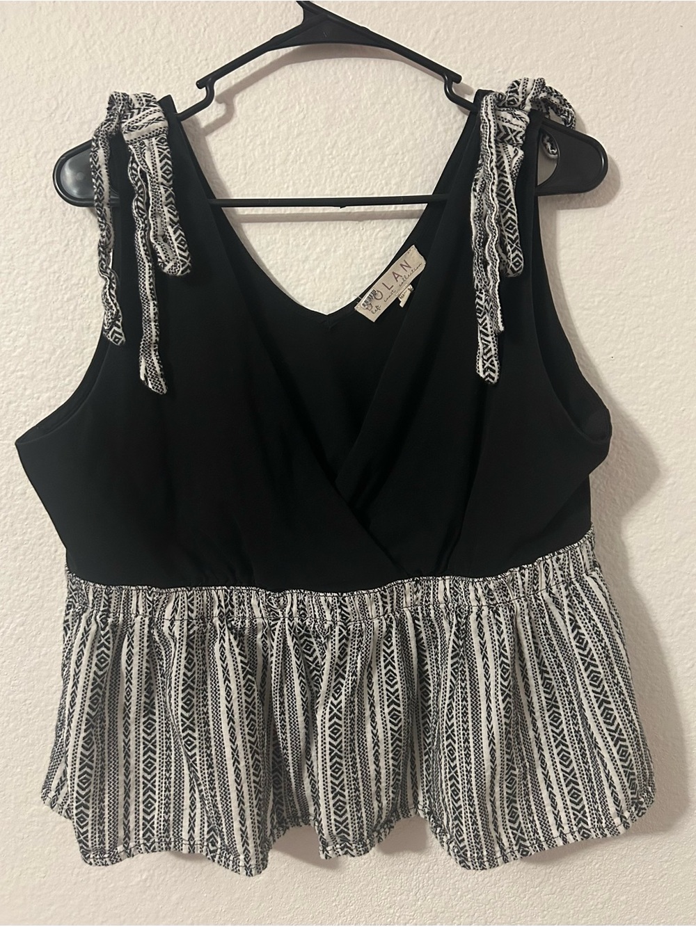 Sleeveless Black & White Tie-Shoulder Peplum Top